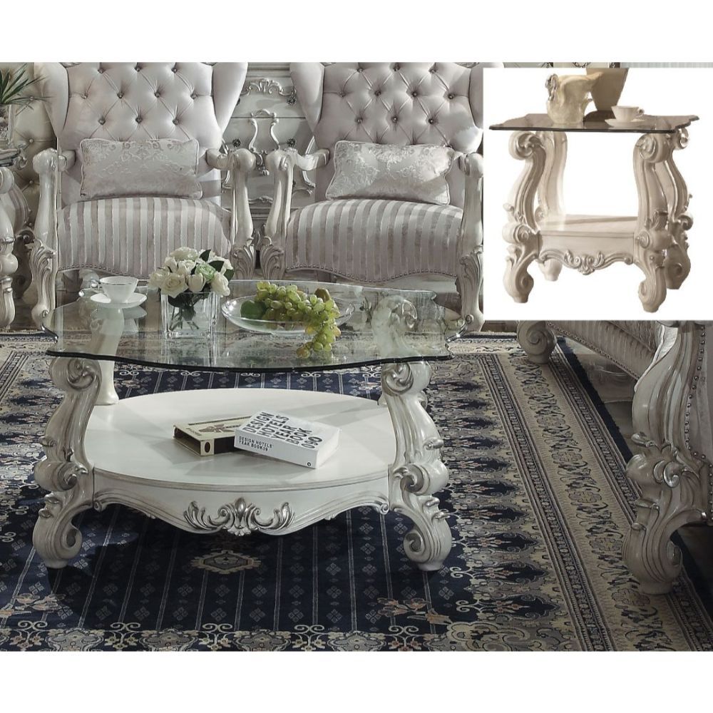 KD, Coffee Table w/Curved Glass Top â€¢ Open Compartment: Bottom Shelf â€¢ 10mm Clear Tempered Glass w/Beveled â€¢ Oversized Scrolled Legs & Shelf Apron: Poly Resin with Antique Contrast Finish<br/><br/><b>Product Features</b><ul><li>Coffee Table w/Curved