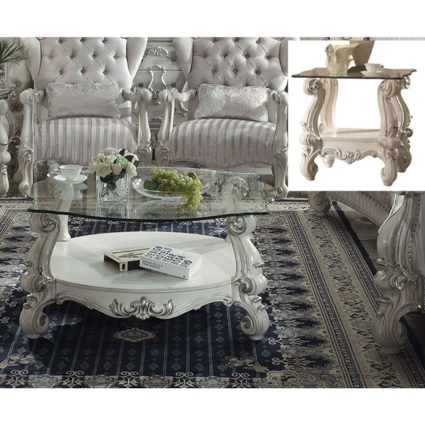  Coffee Table w/Curved Glass Top â€¢ Open Compartment: Bottom Shelf â€¢ 10mm Clear Tempered Glass w/Beveled â€¢ Oversized Scrolled Legs & Shelf Apron: Poly Resin with Antique Contrast Finish<br/><br/><b>Product Features</b><ul><li>Coffee Table w/Curved