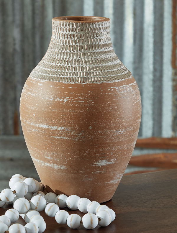  earthy design comes to life with this terra cotta vase. A distressed white patina is the perfect finish for this piece