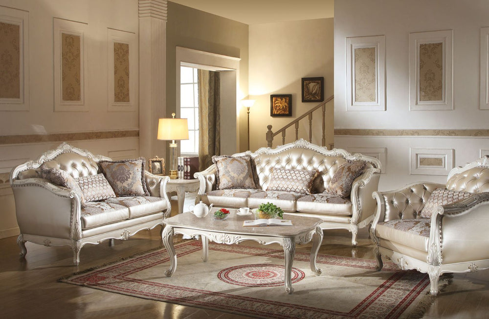 Designed exclusively for ACME, the Chantelle sofa collection is filled with romantic wonder. The rose gold PU seat back and pearl white wood finish combined with a broad selection of marble top coffee table creates an elegant and luxurious living room.<br