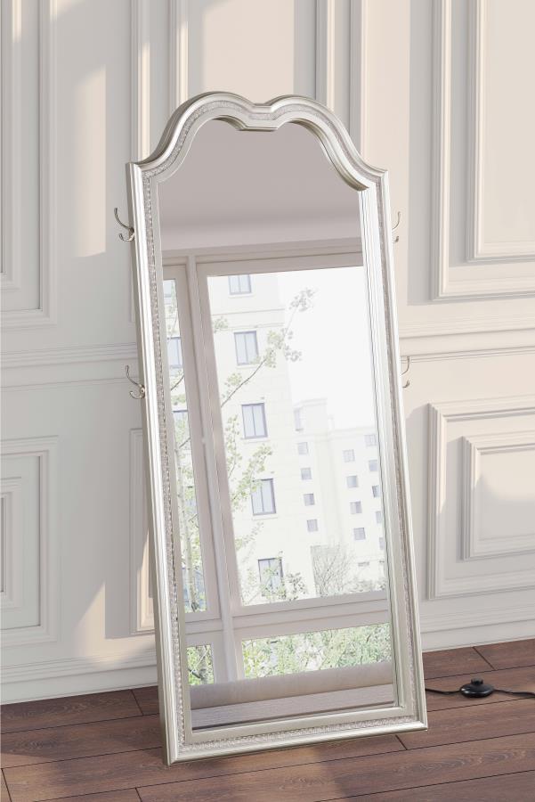 Chic couture style is a featured element of a lighted LED floor mirror well suited to fashionable living spaces. The Evangeline floor mirror offers a shapely silhouette with an arch top and rectangular profile. Its pine wood frame offers a silver oak fini