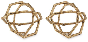 This sculpture is a cool and contemporary take on geometric design. Its interlocking rings, finished in a luxe antiqued brass tone, bring a sense of movement to your decor. An eye-catching complement to your existing accents, the boldly designed piece als
