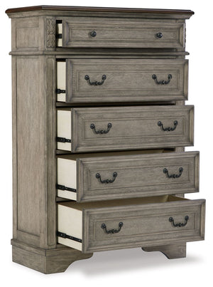  deep walnut on the top. Framed drawer fronts and dark bronze-tone hardware marry