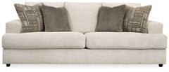 Flaunting a trendsetting silhouette, this sofa puts the contemporary in your contemporary home. Its â€œthree over twoâ€ profile eliminates the center seat cushion, giving you elongated plushness and deep seating. And the chunky chenille fabric satisfies 