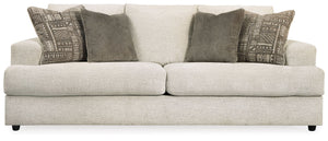 Flaunting a trendsetting silhouette, this sofa puts the contemporary in your contemporary home. Its â€œthree over twoâ€ profile eliminates the center seat cushion, giving you elongated plushness and deep seating. And the chunky chenille fabric satisfies 