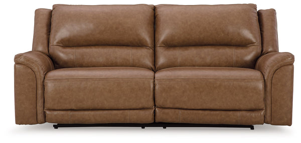 This power reclining sofa delivers comfort and contemporary style in a big (but not bulky) way. Its supple leather and faux leather upholstery, sumptuous cushioning and one-touch control are sure to take you to your happy place. The sofa-'s power adjustab