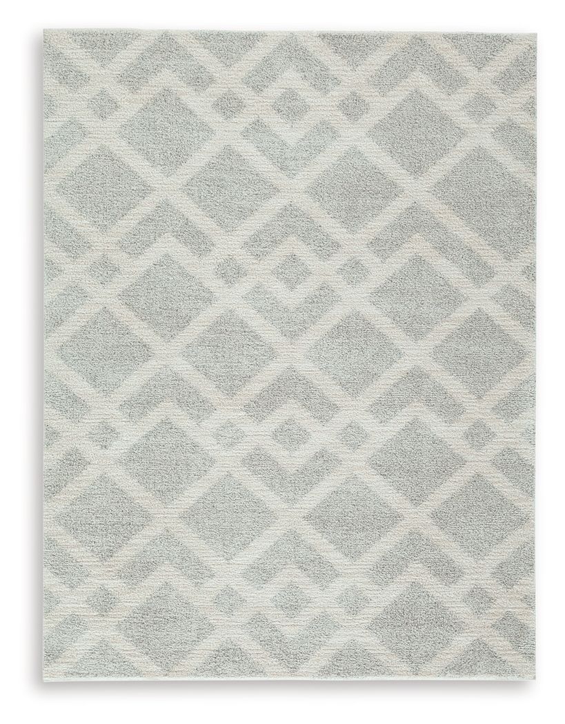 Time for a floor refresh? This trend-right rug is buzzing with interest and newfound energy. Its dynamic geometric design is grounded by subtle shades of gray and ivory that complement so many settings. Weâ€™re talkinâ€™ a treat for your feet and a feast 