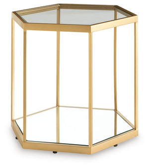 With a sleek goldtone frame accenting glass and mirror insets, this striking accent table combines the very best of modern design. Whether you use it to display decor or hold your favorite drink, the hexagonal design makes it a true standout piece in your