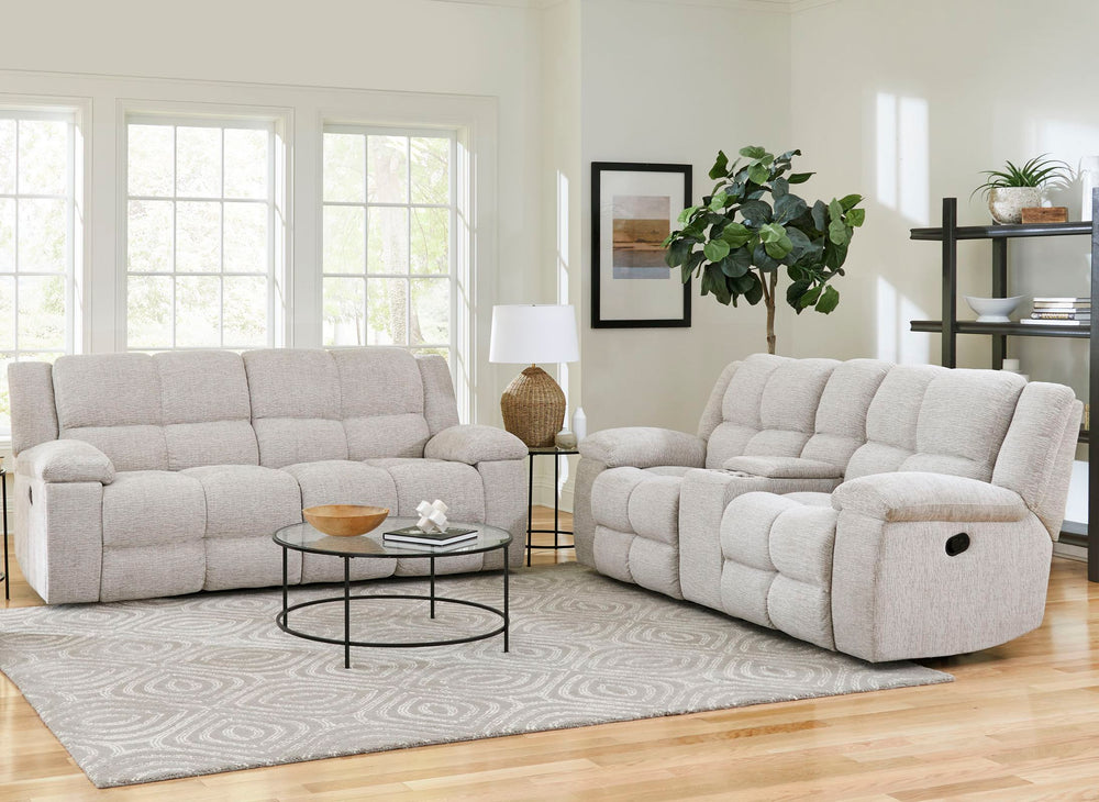 Big and cozy, but make it fancy! The Buster Sofa, Loveseat & Recliner does just that. Two one-and-a-half-sized seats with exaggeratedly large plush cushions and dual manual reclining mechanisms create oversized lounging space that just beckon you to take 