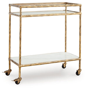 Store and serve in sleek style with this bar cart. Its casually cool design combines an antiqued brass-tone frame with white marble and clear glass. Rails on the top shelf help bottles and shakers stay organized. And with its rolling casters, you can make