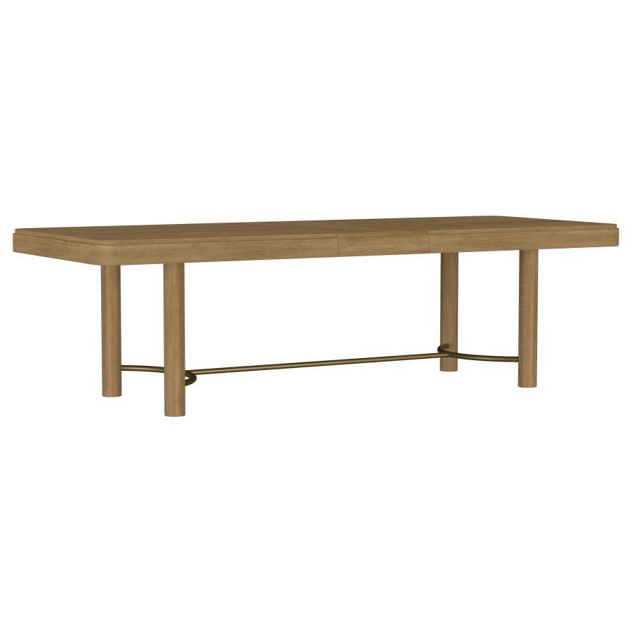 This dining table blends modern refinement with functional design, featuring a trestle base with a metal stretcher bar that adds a contemporary industrial touch. The rounded corners soften the clean lines of the rectangular tabletop, creating a welcoming 