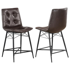 Cool and cozy, this counter height stool is the ultimate dining room upgrade. The padded seat is wrapped in smooth leatherette for an inviting look and feel. Button tufting adds a subtle, decorative touch. A sleek, metal base gives it a modern look while 