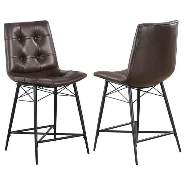 Cool and cozy, this counter height stool is the ultimate dining room upgrade. The padded seat is wrapped in smooth leatherette for an inviting look and feel. Button tufting adds a subtle, decorative touch. A sleek, metal base gives it a modern look while 