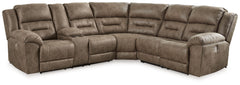 This power reclining sectional is designed exclusively for those who are serious about R&R. Its overstuffed cushions and pillow top arms feel oh-so-plush, and the faux leather upholstery accented with jumbo stitching is silky soft. Go from upright to recl