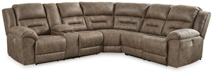 This power reclining sectional is designed exclusively for those who are serious about R&R. Its overstuffed cushions and pillow top arms feel oh-so-plush, and the faux leather upholstery accented with jumbo stitching is silky soft. Go from upright to recl