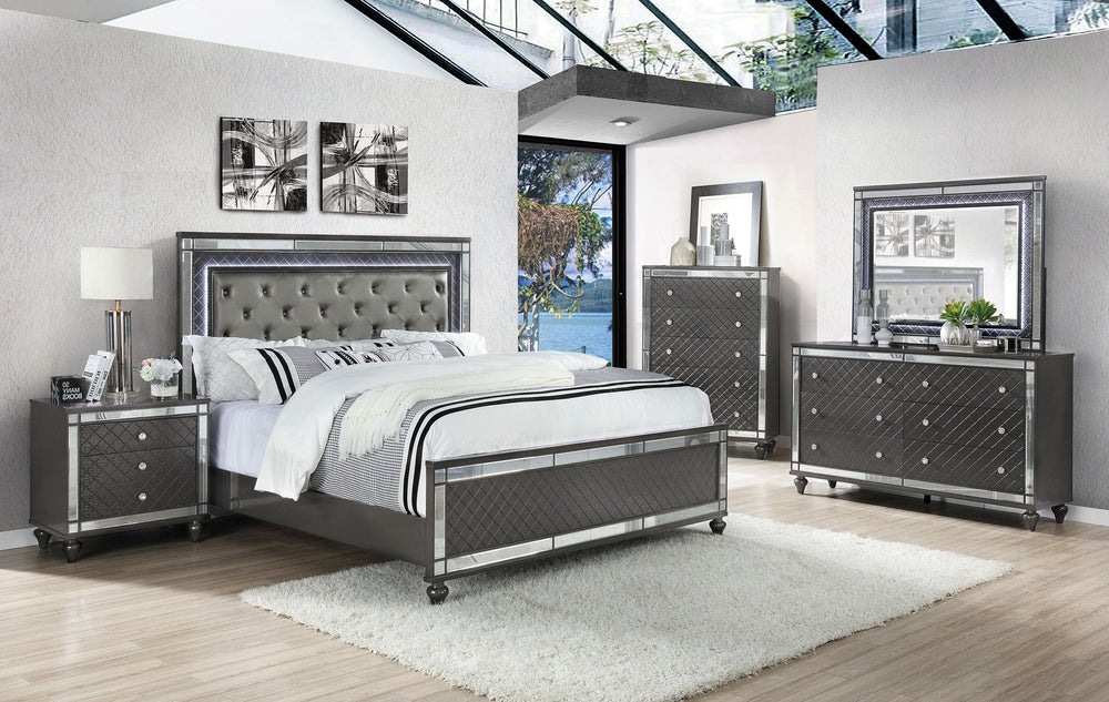 Elevate your sanctuary with this dazzling bedroom collection, where contemporary chic meets timeless charm. The suite boasts a stunning graphite finish, imbuing your space with an air of sophistication and modern luxury. At the heart lies a plush, tufted 