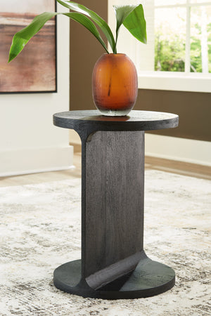  this accent table adds instant style to your home. Crafted of solid mango with a sandblasted black finish