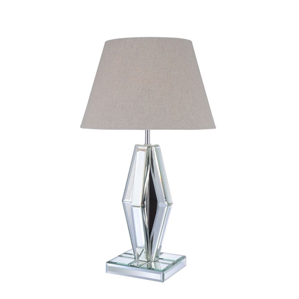 Create a luxurious space with this stunning faceted diamond crystal table lamp. This Britt table lamp is topped with a light brown fabric barrel shade and mirrored base. Featuring in LED light bulb and rocker switch on power cable, the clear finish expose