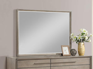  providing a neutral yet stylish accent. Its clean-lined frame echoes the mitered trim of the dresser