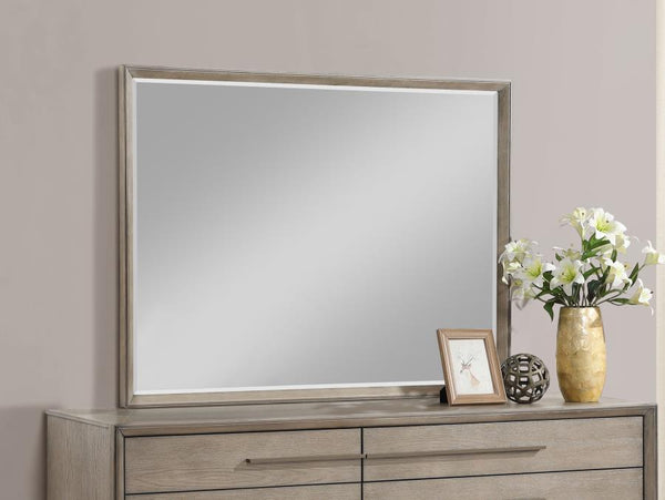  providing a neutral yet stylish accent. Its clean-lined frame echoes the mitered trim of the dresser