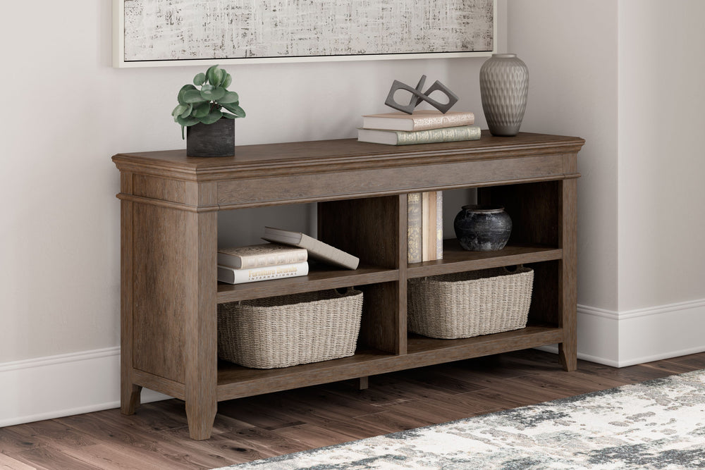Make a style statement with this home office credenza. Its traditional design is updated with an on-trend weathered gray finish and wire-brushed texture. The credenza-'s open storage and adjustable shelving add up to a well-organized workspace.<br><br><b>
