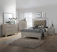 Step into a realm of sophistication and comfort with this stunning bedroom collection. Each piece showcases an exquisite blend of traditional charm and contemporary flair, making a bold statement with its textured surfaces and elegant champagne finish. Th