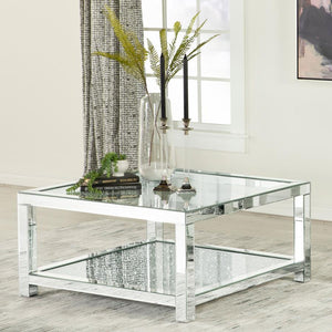  it offers modern flair and sophistication. The sparkling acrylic jewel-encrusted bottom shelf adds a dazzling touc