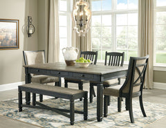 Unique two-tone finish with a combination of Oak and Acacia substrates combining a trendy textured antique black color with table and server tops finished in a textural weathered oak finish. Rectangular dining table features six convenient drawers for sto