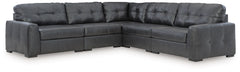 Discover lasting luxury with this sectional. You-'ll experience the perfect blend of comfort and stylish design with its combination of leather and faux leather. Featuring tufted detailing and low-profile legs, this must-have set ensures both coziness and