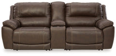 Load up on comfort in a cool, clean-lined and contemporary way with this power reclining loveseat with console in chocolate brown. Rest assured, the expertly matched leather and faux leather upholstery is enriched with a pebble grain effect for authentic 