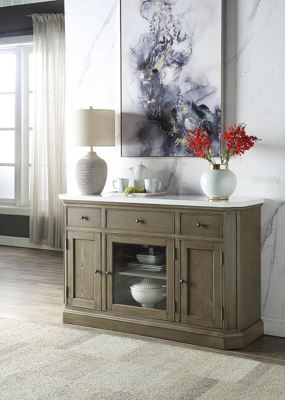 Serving a practical purpose while maintaining a classic design, the server features a gracefully carved wooden base in a weathered oak finish for rich textures and vintage beauty. White artificial marble top provides a clean and perfect counter space that