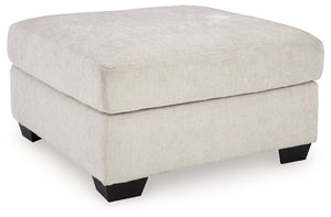 Looking to make a simply chic statement with color? Liven up your living room with this oversized ottoman. Its trend-right light neutral upholstery is a perfect blank canvas for adding pops of color. Pairing posh style with everyday comfort, this piece is