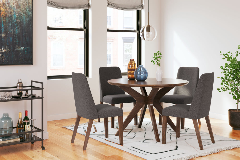 This dining set is a refreshed take on retro aesthetics. The dining table adds an air of playful simplicity to your dining space and the side chair seats invite the eye with a soft-edged silhouette cushion. This set captures the architectural language of 