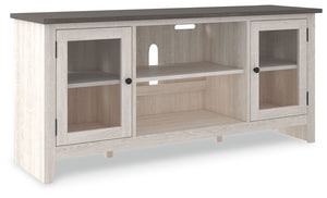 With its two-tone finish and minimalist charm, this TV stand with fireplace option is right in tune with your relaxed approach to high style. Beautifully made to accommodate your media equipment, itâ€™s well equipped with adjustable shelving, cutouts for 