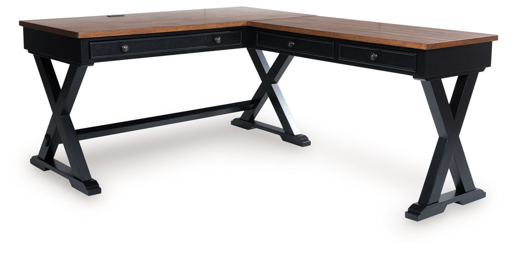 Raise the bar on modern farmhouse style with this home office desk and return. Its casual good looks are accentuated with a two-tone finish, which pairs a warm satin black base with a contrasting butcher block veneer desktop. The drop-down keyboard and tw