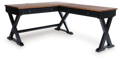 Raise the bar on modern farmhouse style with this home office desk and return. Its casual good looks are accentuated with a two-tone finish, which pairs a warm satin black base with a contrasting butcher block veneer desktop. The drop-down keyboard and tw