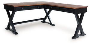 Raise the bar on modern farmhouse style with this home office desk and return. Its casual good looks are accentuated with a two-tone finish, which pairs a warm satin black base with a contrasting butcher block veneer desktop. The drop-down keyboard and tw