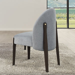 Clayten collection exudes elegance with its rectangular dining table featuring a fixed white marble top and double pedestal base with metal trim. Paired with upholstered chairs and a server with metal legs, this set blends sophistication and contemporary 