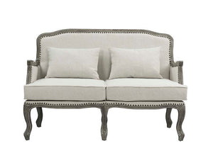  the Tania sofa flaunts a French cabriole silhouette that perches on graceful cabriole legs and showcases its antique-inspired profile. The nailhead trim accents give this piece a moder