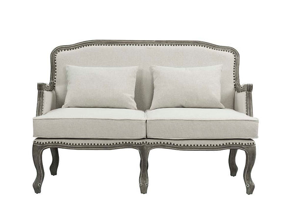  the Tania sofa flaunts a French cabriole silhouette that perches on graceful cabriole legs and showcases its antique-inspired profile. The nailhead trim accents give this piece a moder