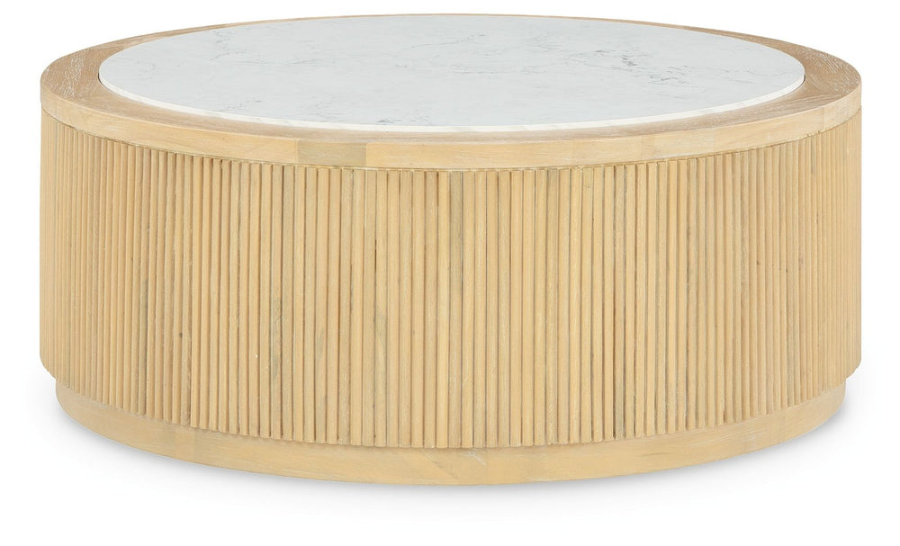 Elegance meets earthy charm in this coffee table. Crafting a contemporary living room? The faux marble top expertly pairs with the reeded base for a trend-right take on day-to-day function. Itâ€™s an ideal spot to rest decorative books and accents. Or pla