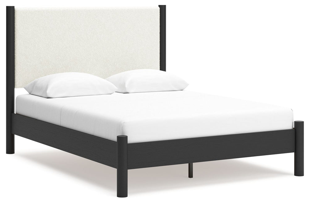 This queen upholstered panel bed reflects your sophisticated approach to boho style. Crafted with both form and function in mind, its fresh white fabric beautifully contrasts the matte black finish. The versatile design suits all-neutral spaces or blends 
