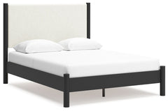 This queen upholstered panel bed reflects your sophisticated approach to boho style. Crafted with both form and function in mind, its fresh white fabric beautifully contrasts the matte black finish. The versatile design suits all-neutral spaces or blends 