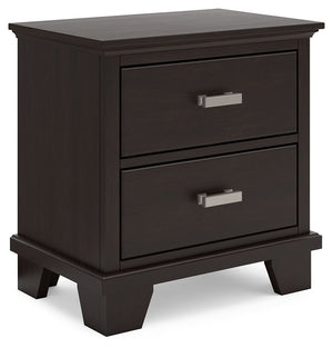 Feast your eyes on this richly versatile nightstand. Its traditional-inspired dark brown finish effortlessly blends with contemporary bright nickel-tone pulls to create a stunning look that-'s not too stuffy or too trendy. Spacious drawers offer plenty of