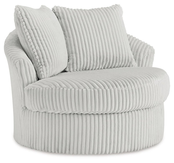 This swivel chair takes style and comfort full circle. Its plush, neutral corduroy upholstery is casually cool and beautifully on trend, while throw pillows elevate the cozy factor. A smooth-gliding 360-degree swivel lets you go with the flow. Come on, yo