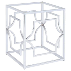 Sculptural and versatile, this round dining table base makes a bold design statement. The geometric metal frame showcases interlocking curved motifs within a square form, finished in a reflective electroplated surface. Designed to support a glass top of y