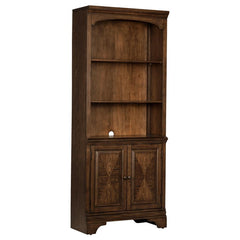 This traditional style bookcase is enhanced with beautiful molded detailing. Two bottom cabinet drawers offer concealed storage for small items. Three open shelves allow you to neatly organize your items. Molded accents on the frame and a curve at the top