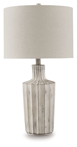 Exuding a casually cool sensibility, this table lamp is a bright idea whether itâ€™s in a living space, bedroom or entry. The shapely base sports a vertical line pattern with a distressed finish that enhances its relaxed appeal.<br><br><b>Additional Dimen