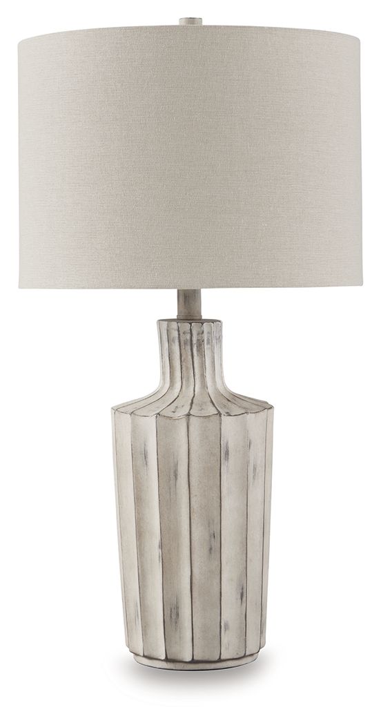 Exuding a casually cool sensibility, this table lamp is a bright idea whether itâ€™s in a living space, bedroom or entry. The shapely base sports a vertical line pattern with a distressed finish that enhances its relaxed appeal.<br><br><b>Additional Dimen