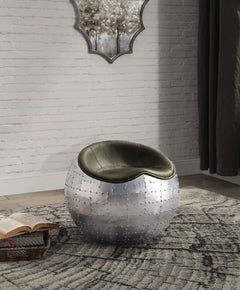 With its whimsically round aluminum base, the Brancaster ottoman is a unique accent seat that will look great in any room. The padded seat is upholstered in top grain leather, and comes in four color options: retro brown, antique ebony, antique red, and a